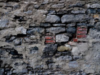 old bricks used in ancient stone wall